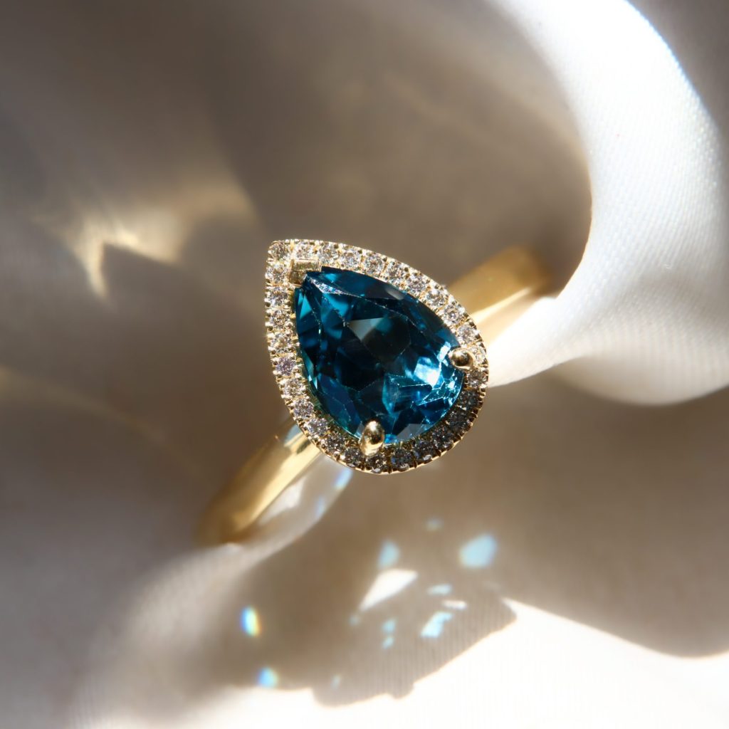 Pear-cut London Blue Topaz & Diamond Halo Ring