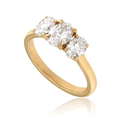 Lab grown oval diamond trilogy ring yellow gold engagement