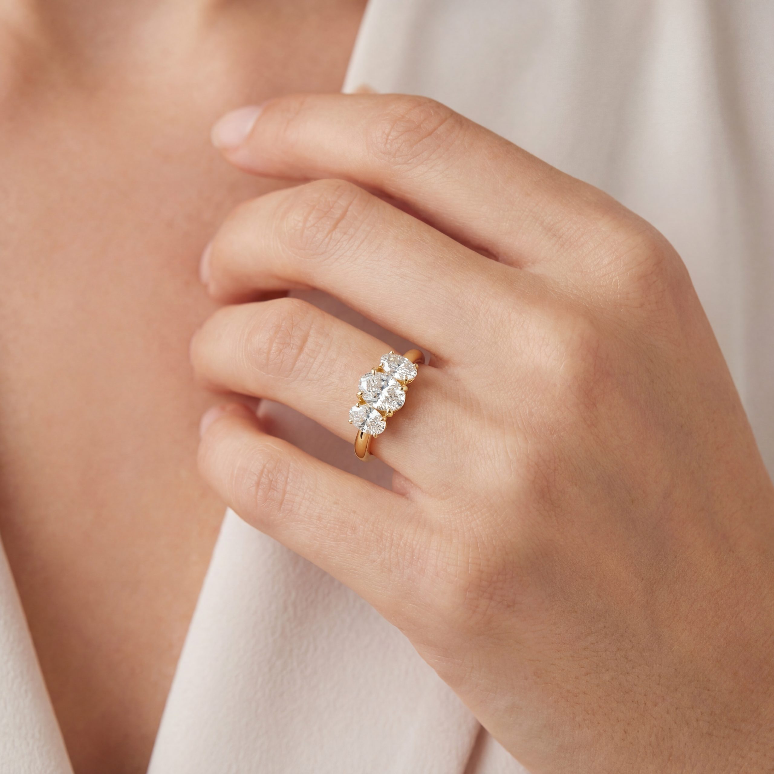 25215 lab grown oval diamond trilogy ring yellow gold Lab grown oval diamond trilogy ring yellow gold engagement